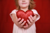 child holding heart
